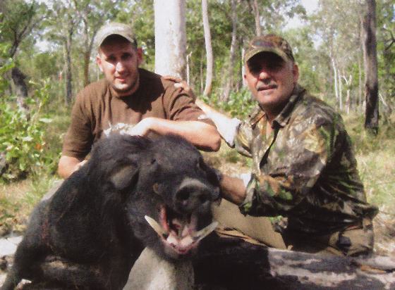 The author and Alisdair recover a massive boar 