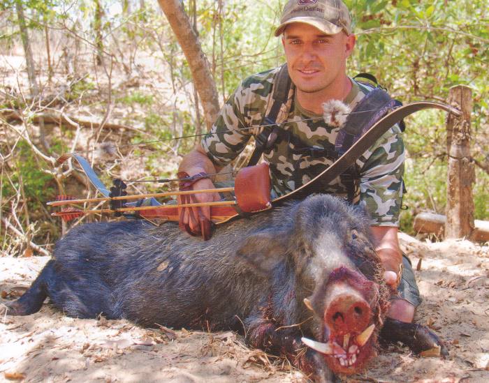 The boar that attached Jeff. His first boar - and it`s trophy class! - Click for enlargement